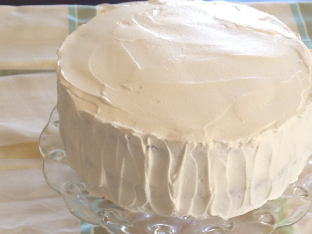 Lemon filled yellow cake with whipped cream frosting
