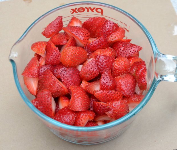 Strawberries prepped for jam