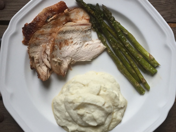 Dinner of roasted chicken, cauliflower mash and oven roasted asparagus